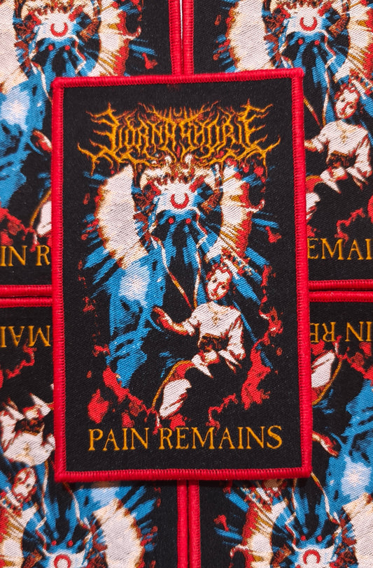 P A I N   R E M A I N S  -