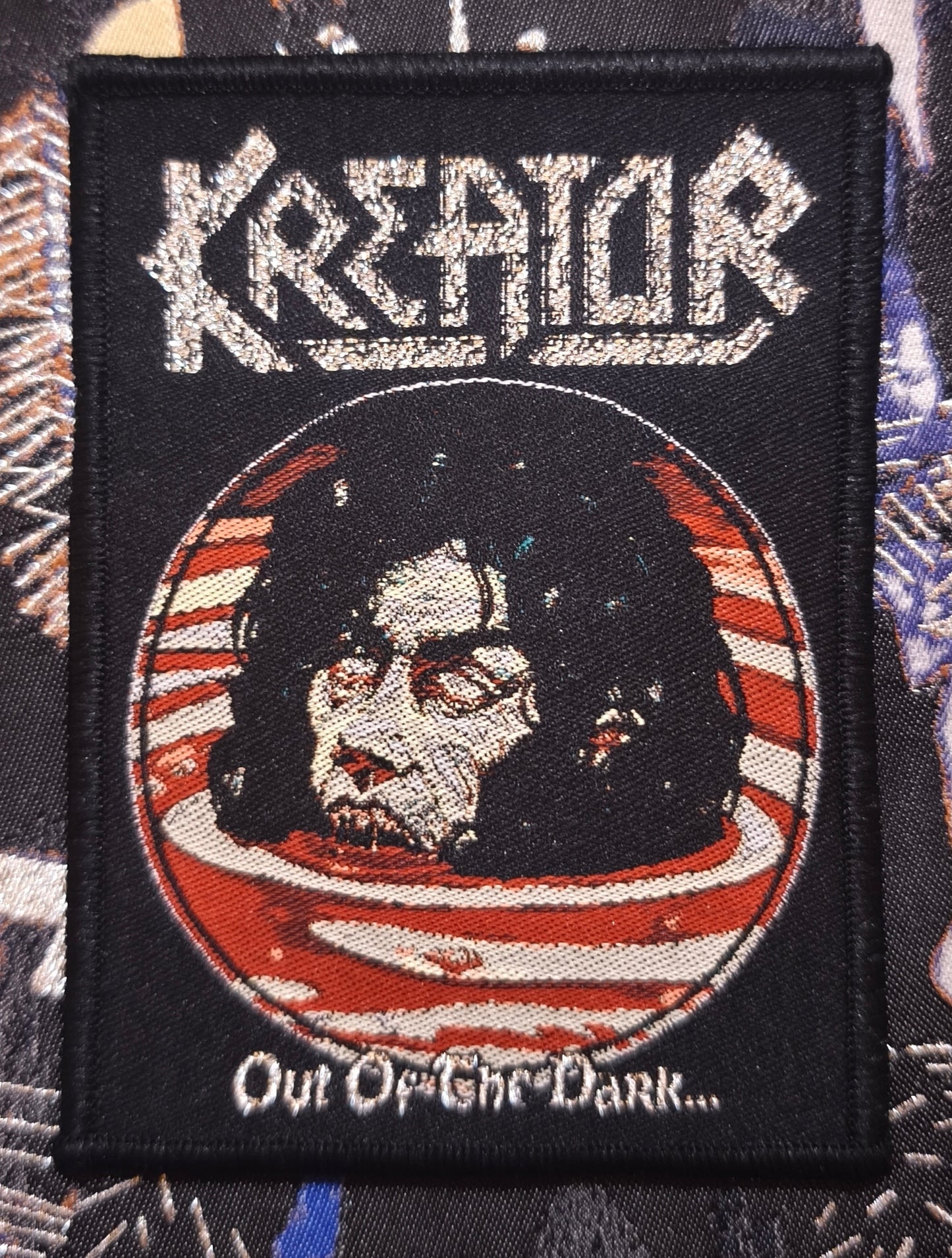 OUT OF THE DARK...